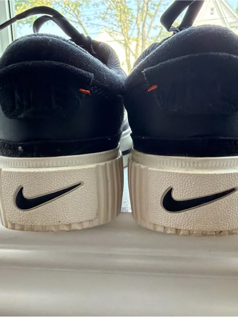 Nike Black Sneakers with White Swoosh